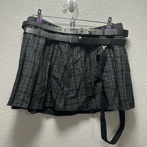 Size large Hot Topic plaid skirt with belts.